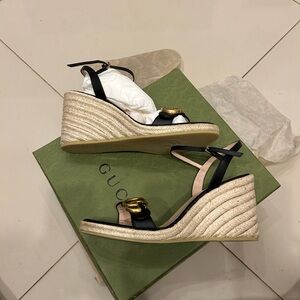 Gucci Black and Gold Wedge Sandals